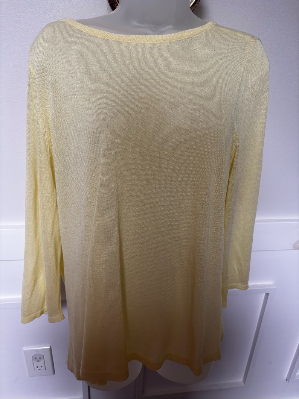 lightweight knit split-back top in a pale yellow